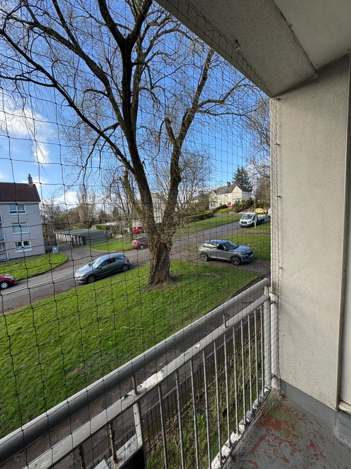 Balcony bird netting fitted across a residential development