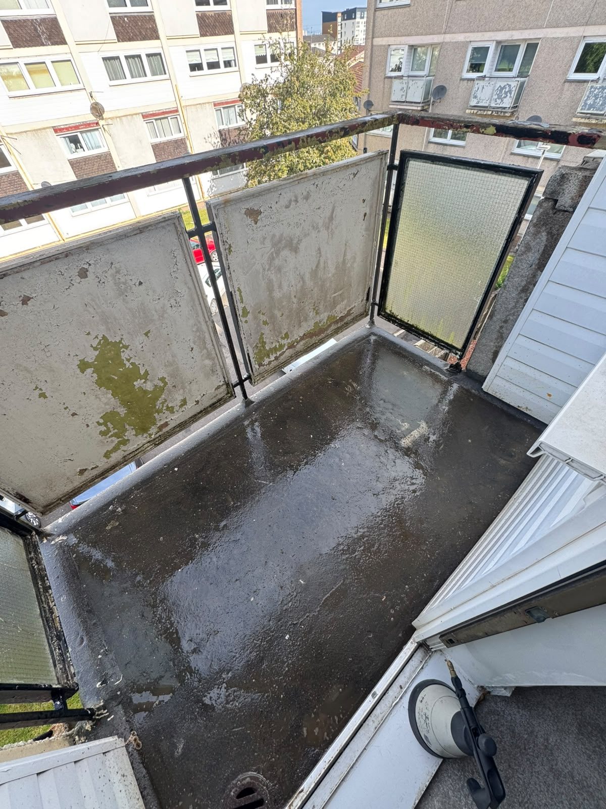 Apartment balcony soiled with pigeon fouling before clearance and proofing