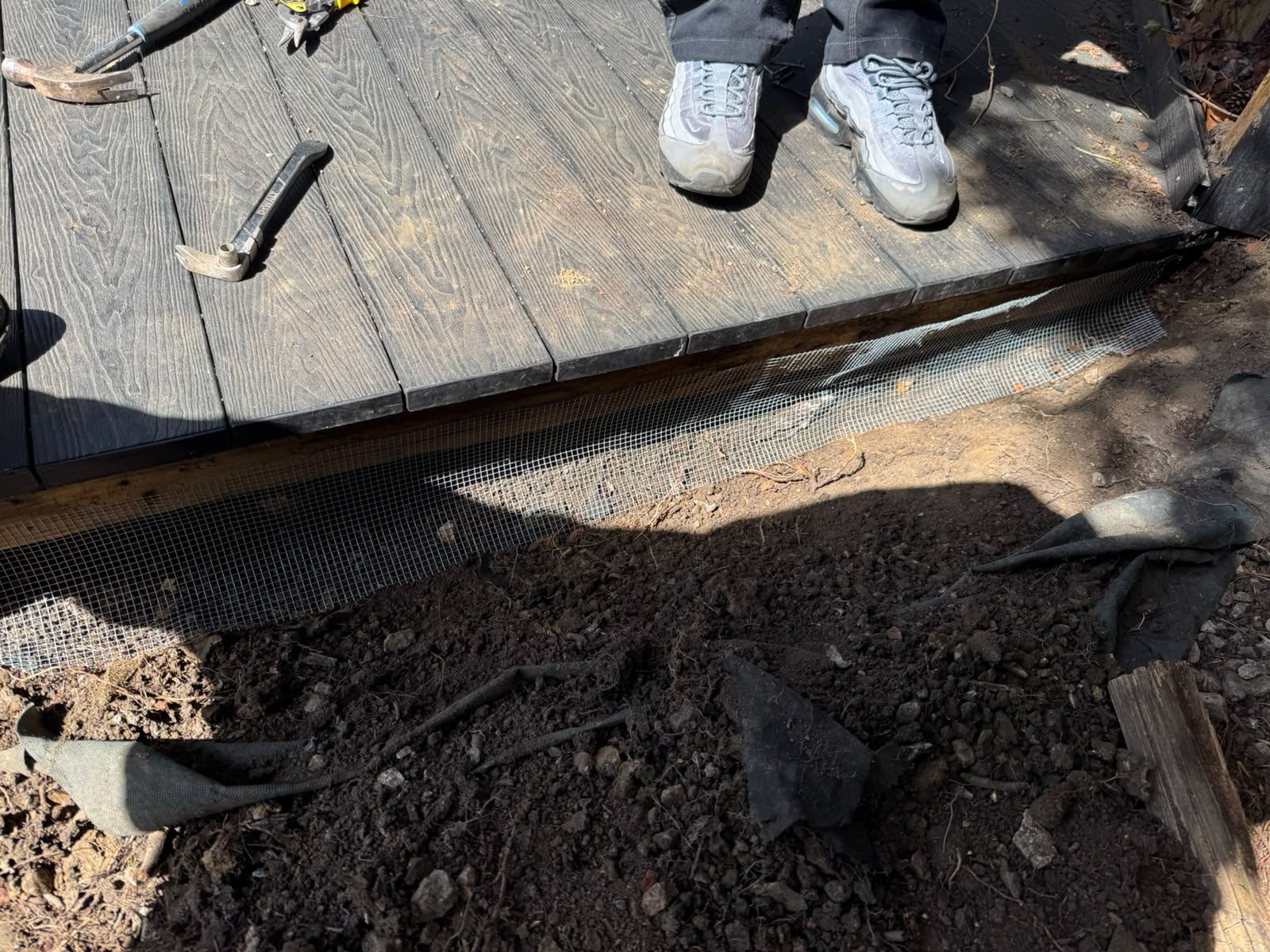 Mesh proofing installed around a raised deck to block rat harbourage