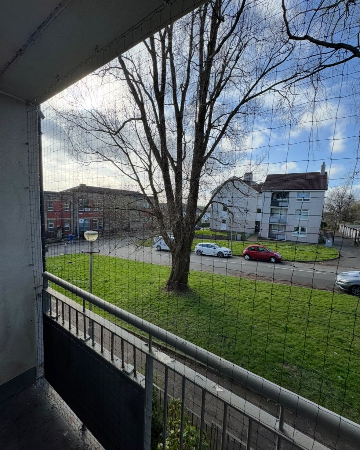 Balcony bird netting fitted to a residential block in Glasgow