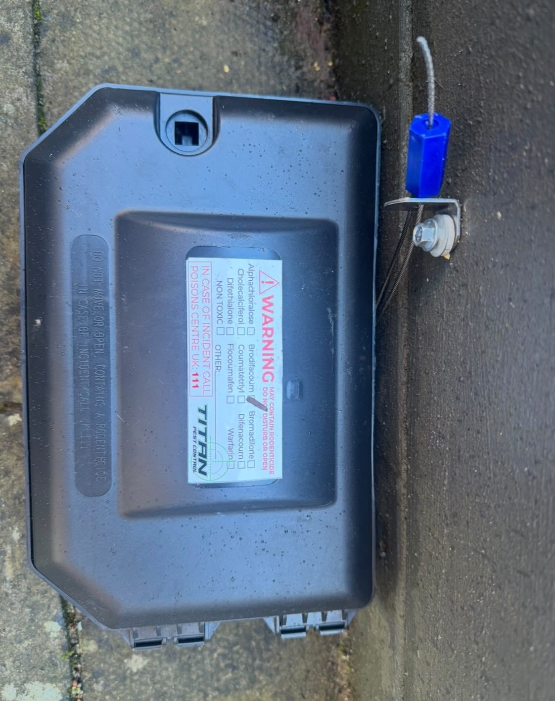 Locked external rat bait station secured on site in Glasgow